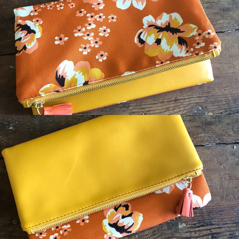 Reverse flora clutch bag
